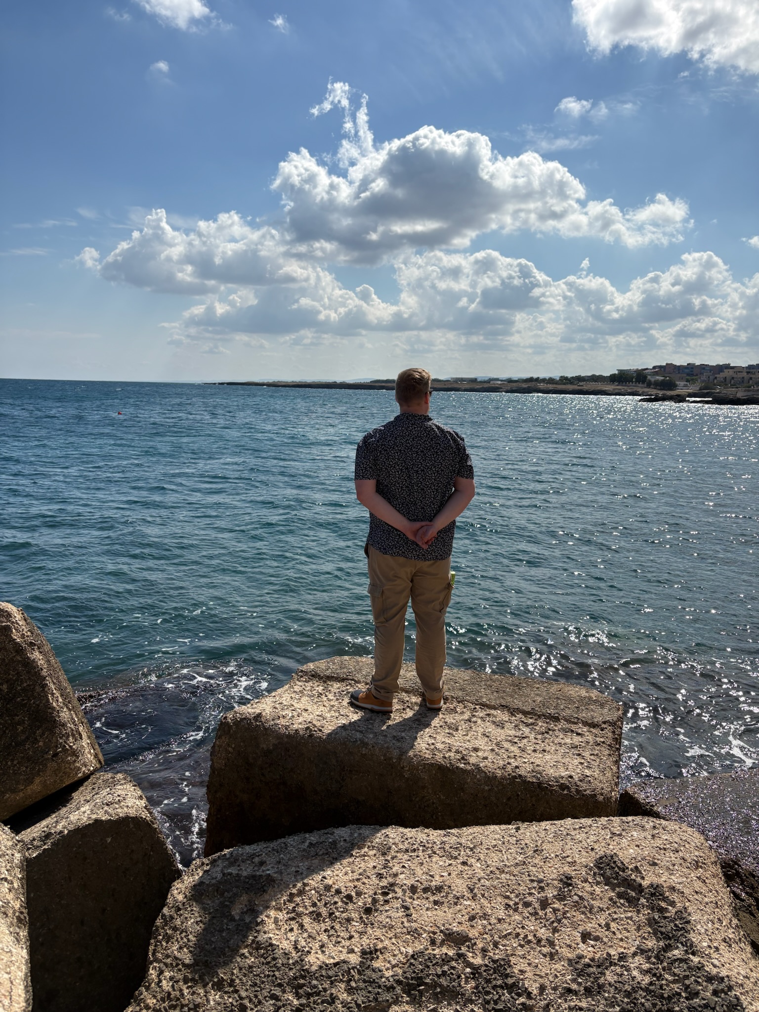 A picture of myself looking out over the Sea, in Monopoli, Italy