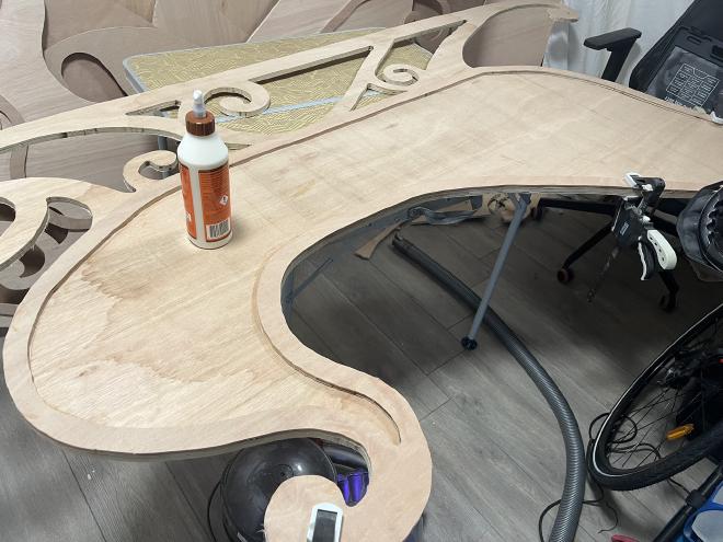 The first trim piece being glued in place