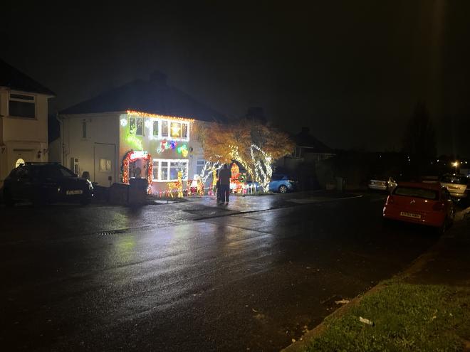 Two fans coming to see the lights at night