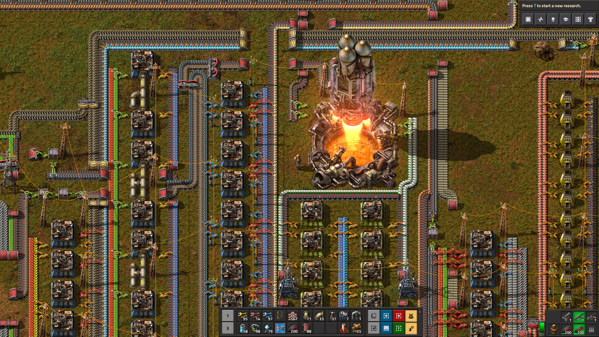 Screenshot of Factorio where a rocket is launching out of a silo surrounded by a factory/home/pw/Downloads/press-kit/screenshots/screenshot-6.jpg