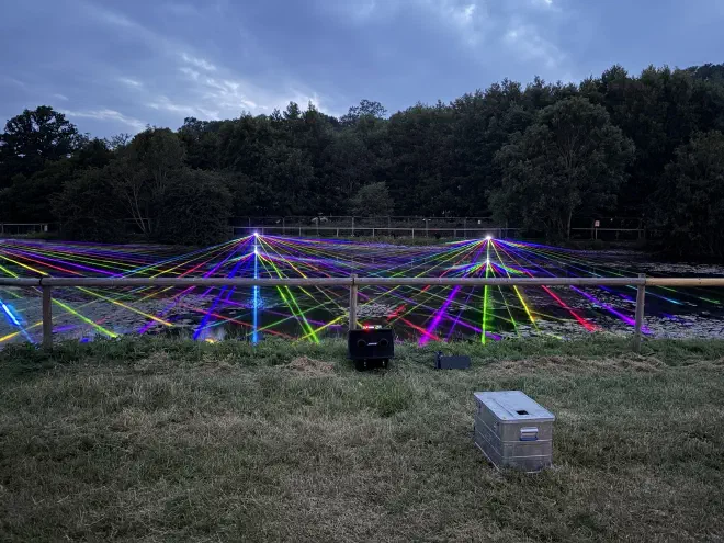 Lasers over the lake Colourful lasers shoot out over the lake